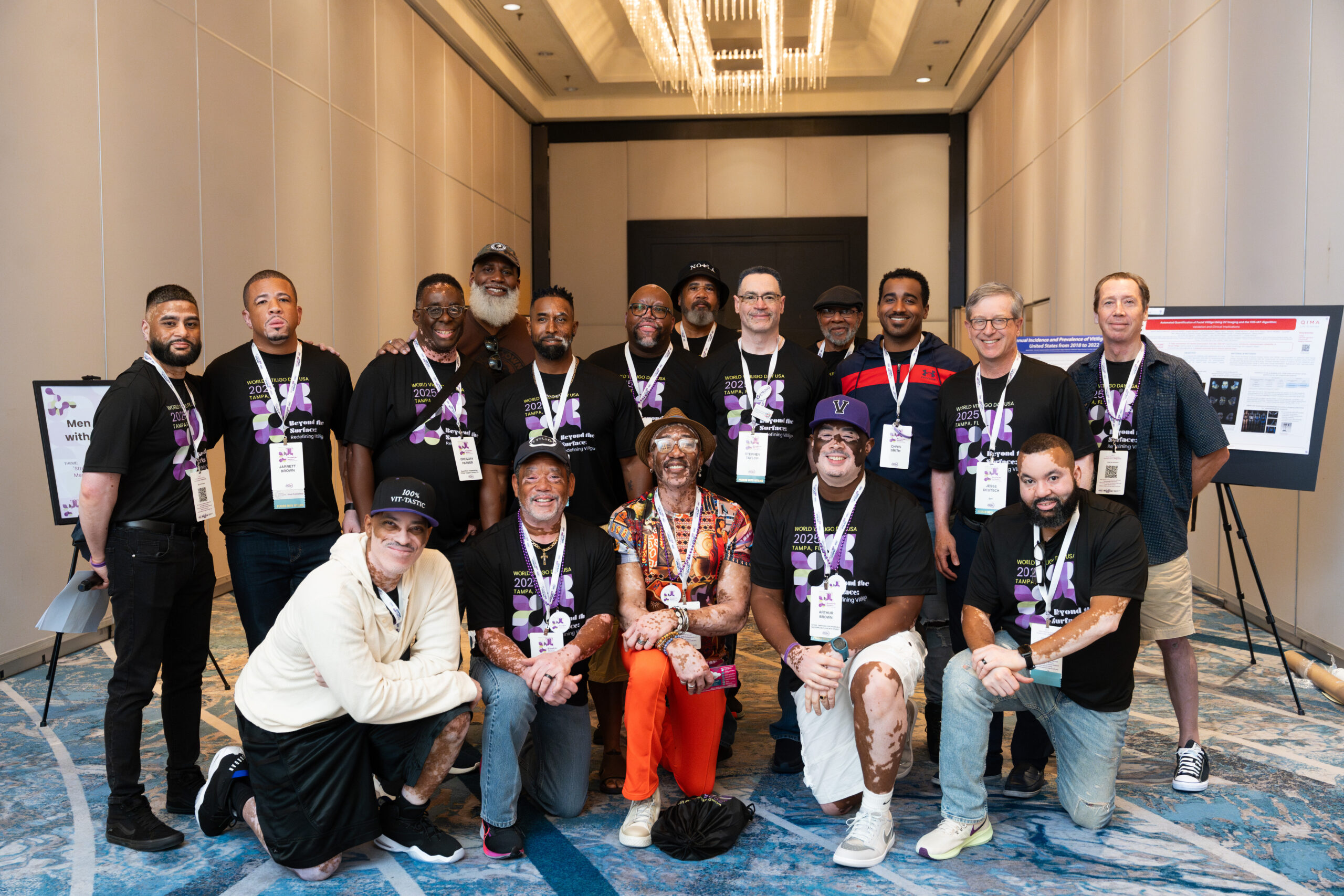 A group of men at a conference